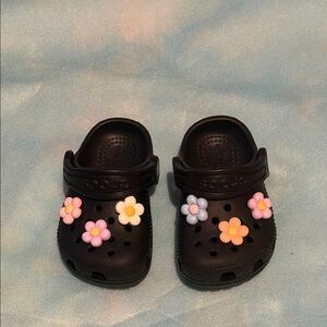 Crocs - Black colored classic crocs with removable flowers  - Size: C5